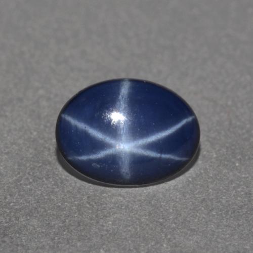Safira estrela azul natural 0,89ct, corte oval, opaco