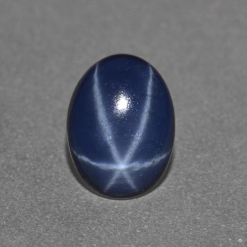 Safira estrela azul natural 0,89ct, corte oval, opaco