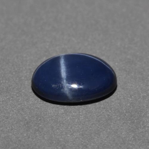 Safira estrela azul natural 0,89ct, corte oval, opaco