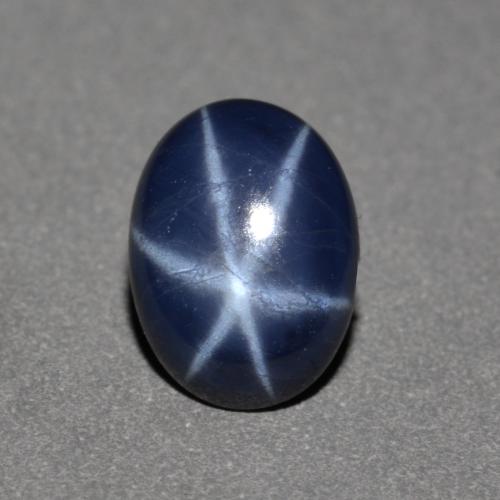 Safira estrela azul natural 0,97ct, corte oval, opaco