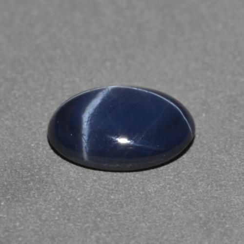 Safira estrela azul natural 0,97ct, corte oval, opaco