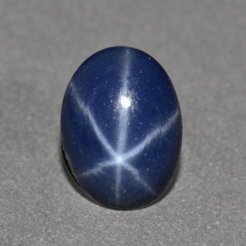 Safira estrela azul natural 0,75ct, corte oval, opaco