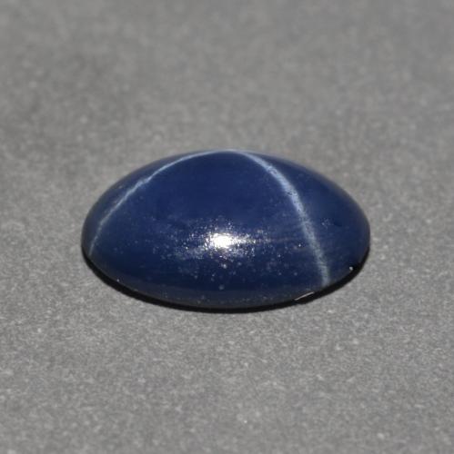 Safira estrela azul natural 0,75ct, corte oval, opaco