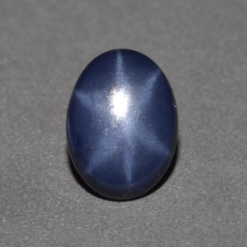 Safira estrela azul natural 0,90ct, corte oval, opaco