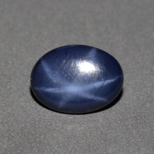 Safira estrela azul natural 0,90ct, corte oval, opaco