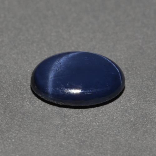 Safira estrela azul natural 0,90ct, corte oval, opaco