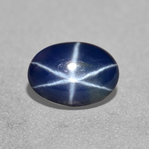 Safira estrela azul natural 1,26ct, corte oval, translúcido