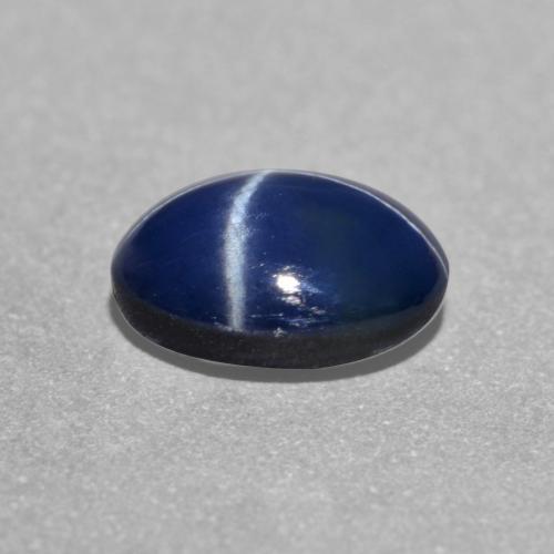 Safira estrela azul natural 1,26ct, corte oval, translúcido