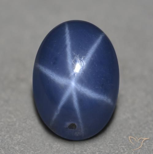 Safira estrela azul natural 1,25ct, corte oval, translúcido