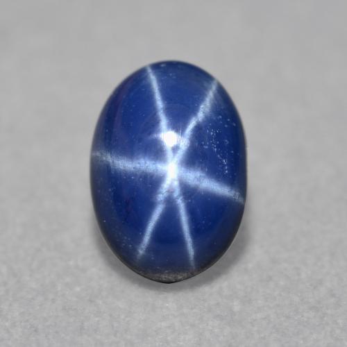 Safira estrela azul natural 0,84ct, corte oval, translúcido
