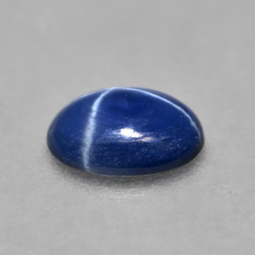 Safira estrela azul natural 0,84ct, corte oval, translúcido