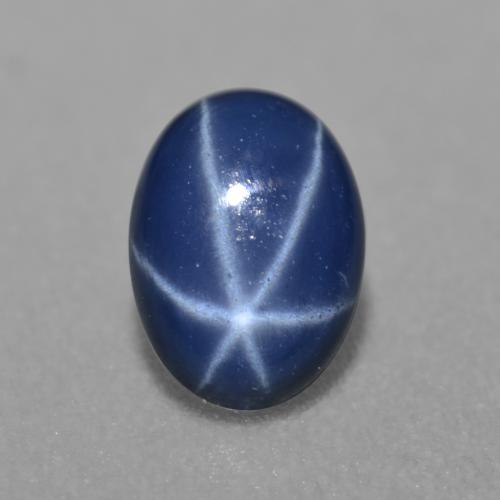Safira estrela azul natural 0,89ct, corte oval, translúcido