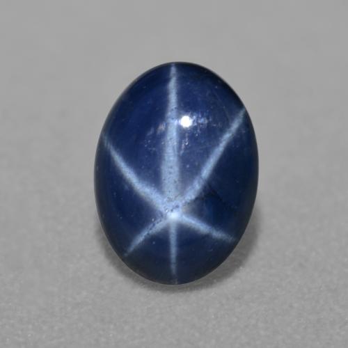 Safira estrela azul natural 0,84ct, corte oval, translúcido