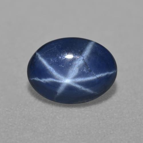 Safira estrela azul natural 0,84ct, corte oval, translúcido