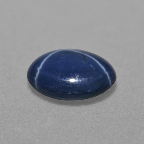 Safira estrela azul natural 0,84ct, corte oval, translúcido