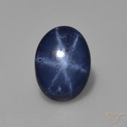 Safira estrela azul natural 0,89ct, corte oval, opaco