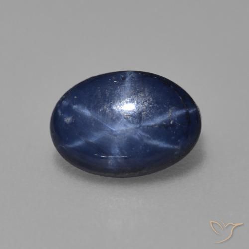 Safira estrela azul natural 0,89ct, corte oval, opaco