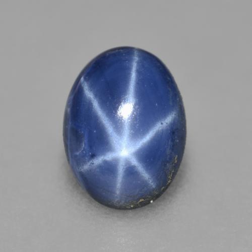 Safira estrela azul natural 0,99ct, corte oval, opaco