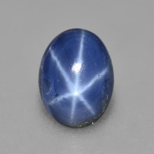 Safira estrela azul natural 0,99ct, corte oval, opaco
