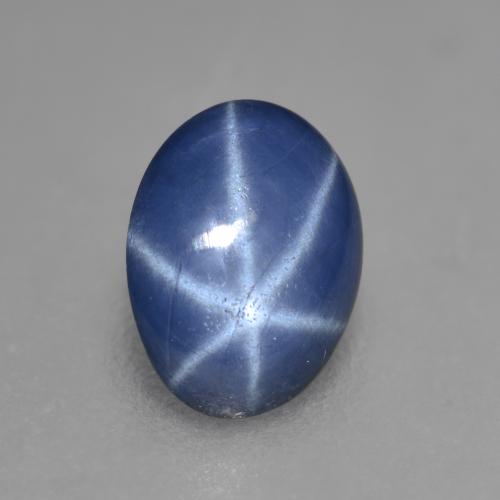 Safira estrela azul natural 0,88ct, corte oval, translúcido