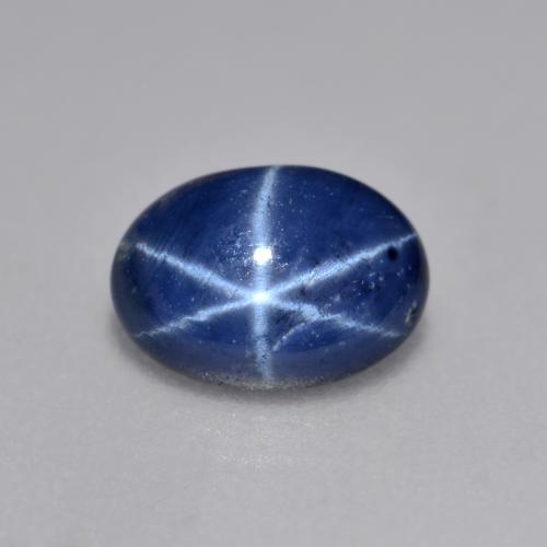 Safira estrela azul natural 0,99ct, corte oval, opaco