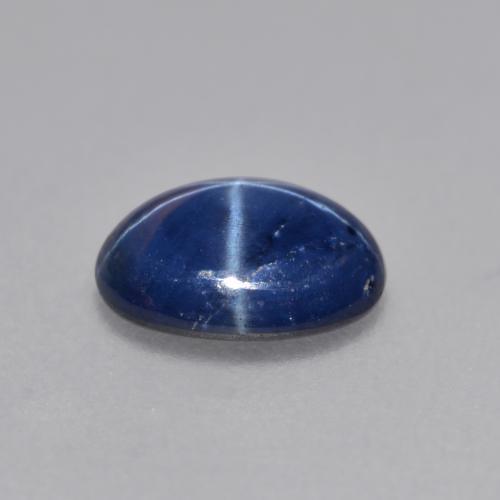 Safira estrela azul natural 0,99ct, corte oval, opaco