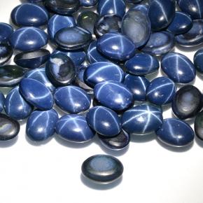 Safira estrela azul natural 1,05ct, corte oval, opaco