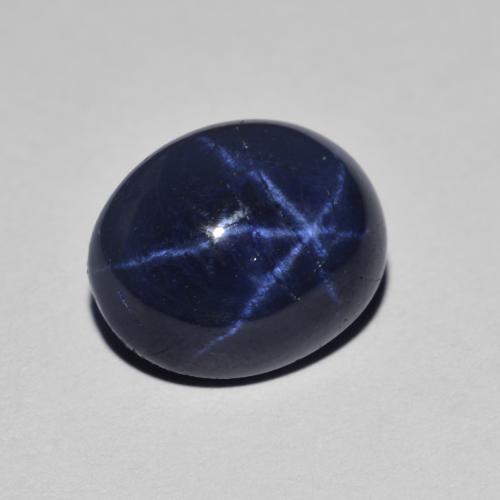 Safira estrela azul natural 3,93ct, corte oval, opaco
