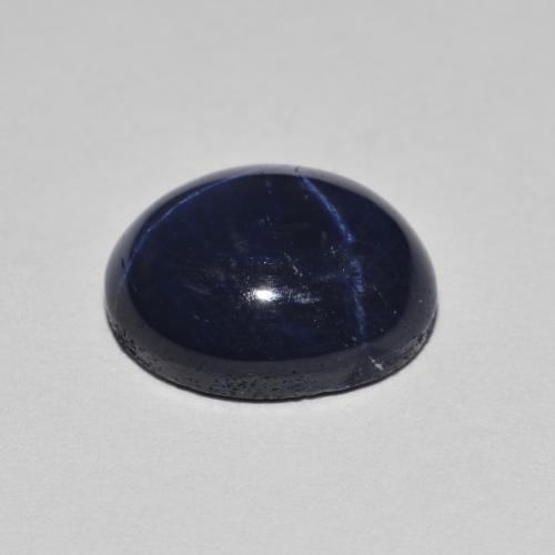 Safira estrela azul natural 3,93ct, corte oval, opaco