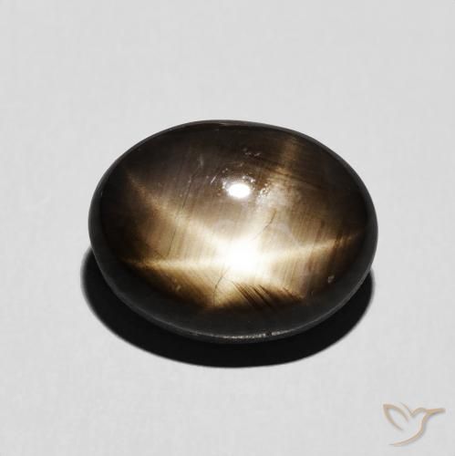 Safira estrela preto natural 6,54ct, corte oval, opaco