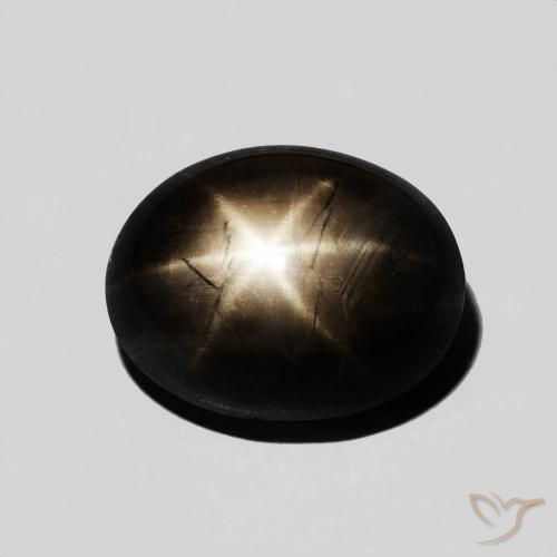 Safira estrela preto natural 6,48ct, corte oval, opaco