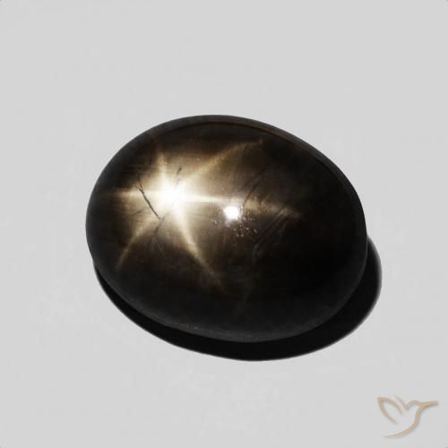 Safira estrela preto natural 6,48ct, corte oval, opaco