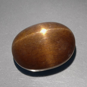 Pedra do sol estrela marrom natural 23,68ct, corte oval, opaco