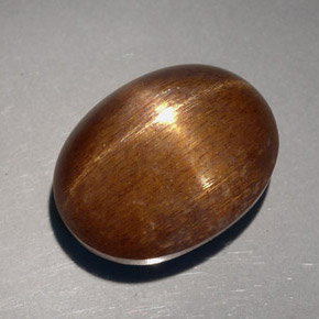 Pedra do sol estrela marrom natural 23,68ct, corte oval, opaco
