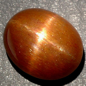 Pedra do sol estrela marrom natural 27,65ct, corte oval, opaco