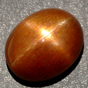 Pedra do sol estrela marrom natural 27,65ct, corte oval, opaco