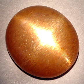 Pedra do sol estrela marrom dourado natural 23,28ct, corte oval, opaco