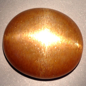 Pedra do sol estrela marrom dourado natural 23,28ct, corte oval, opaco