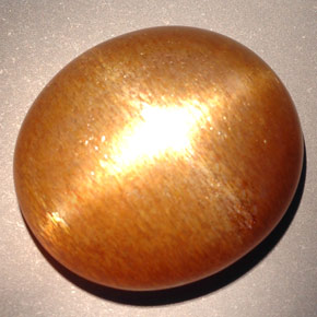 Pedra do sol estrela marrom dourado natural 23,28ct, corte oval, opaco