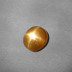 Pedra do sol estrela marrom natural 0,80ct, corte oval, opaco