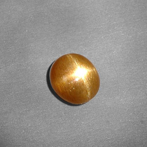 Pedra do sol estrela marrom natural 0,80ct, corte oval, opaco