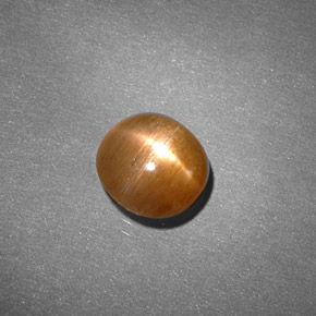 Pedra do sol estrela marrom natural 0,91ct, corte oval, opaco