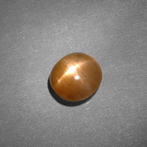 Pedra do sol estrela marrom natural 0,91ct, corte oval, opaco