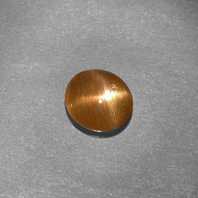 Pedra do sol estrela marrom natural 0,79ct, corte oval, opaco