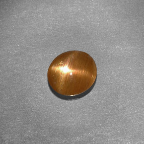 Pedra do sol estrela marrom natural 0,79ct, corte oval, opaco