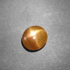 Pedra do sol estrela marrom natural 0,99ct, corte oval, opaco