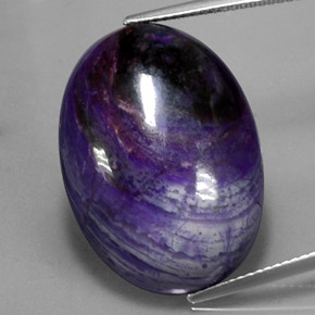 Sugilita multicolorido natural 27,34ct, corte oval, opaco