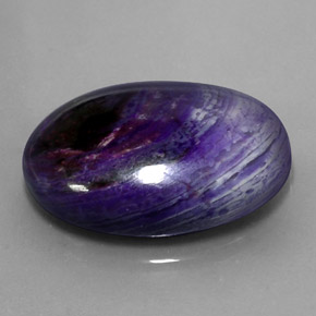 Sugilita multicolorido natural 27,34ct, corte oval, opaco