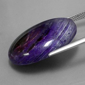 Sugilita multicolorido natural 27,34ct, corte oval, opaco