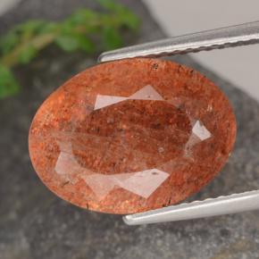 Pedra do sol laranja natural 5,25ct, corte oval, translúcido
